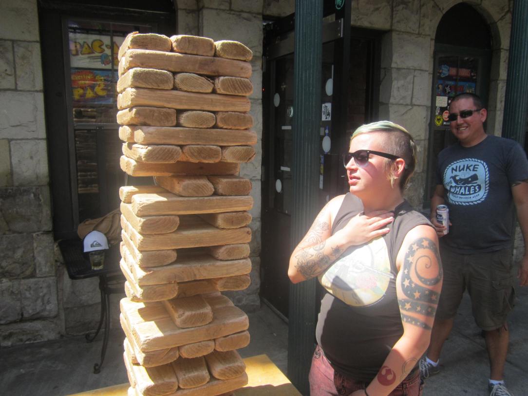 Rebecca contemplating her next move; Jon is clearly amused